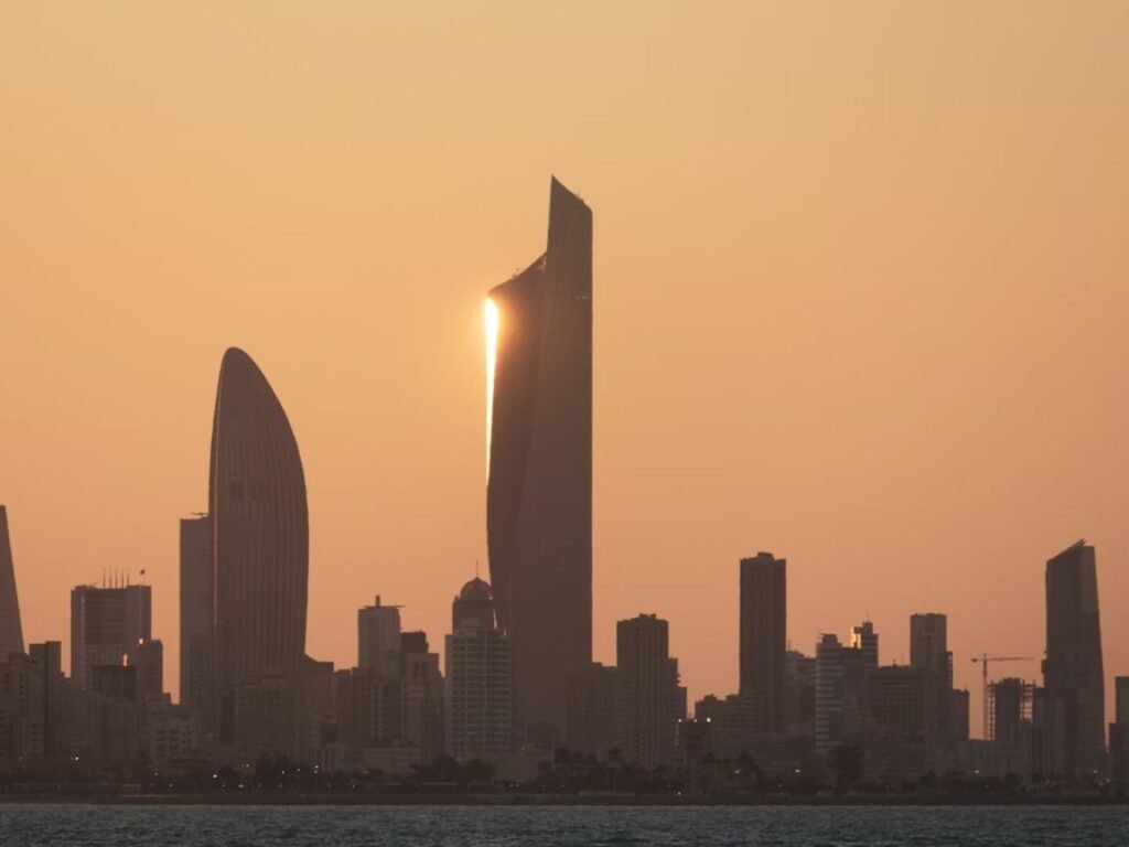 Is 3000 KWD a good salary in Kuwait — Kuwait City skyline at dusk with the Kuwait Towers in the background